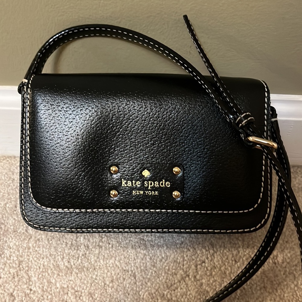 Kate Spade Black Leather handbag- 7.5 x 5 x 2 inches.